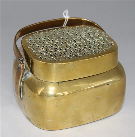 A Chinese bronze hand warmer